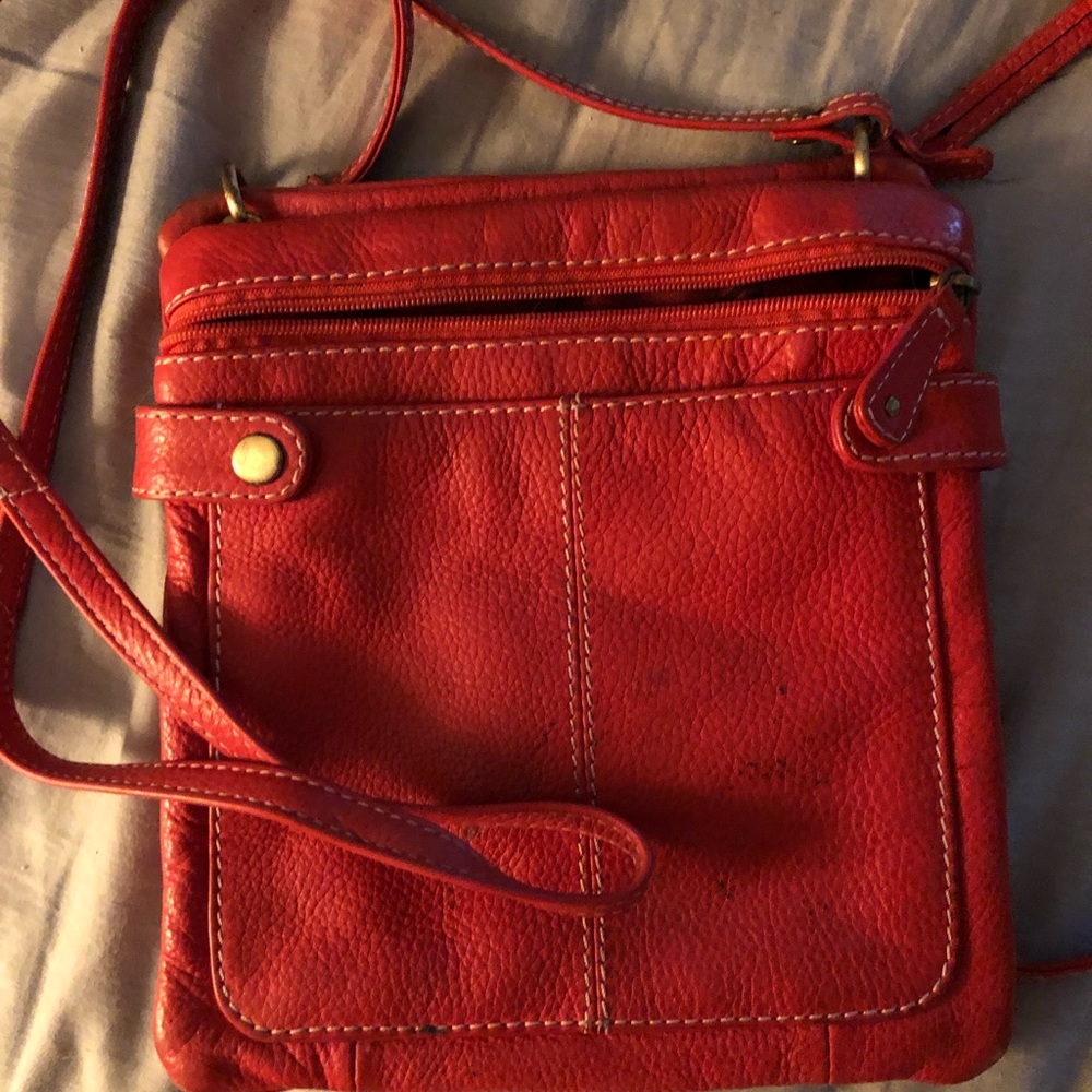 Y es Saint Laurent’s charming orange tote